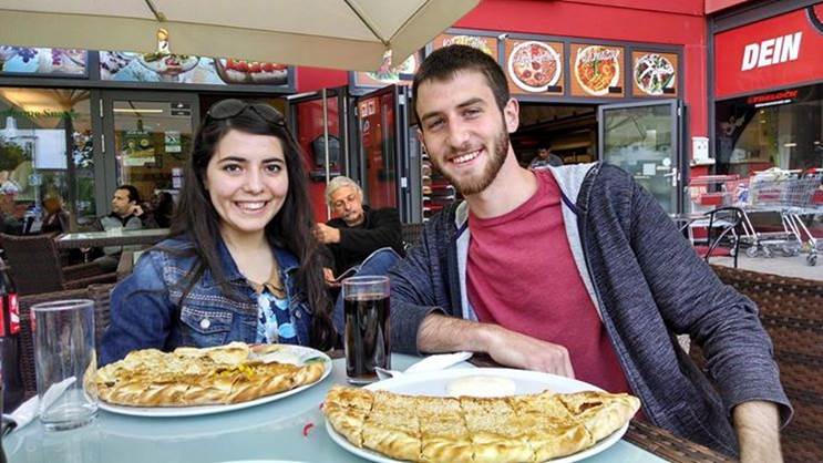 Two students dining abroad